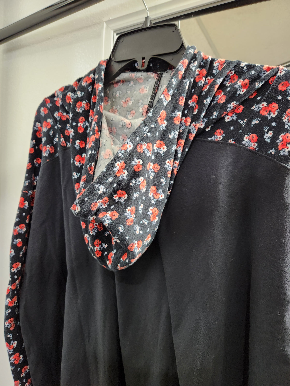 Free People hoodie black color and floral print sleeve