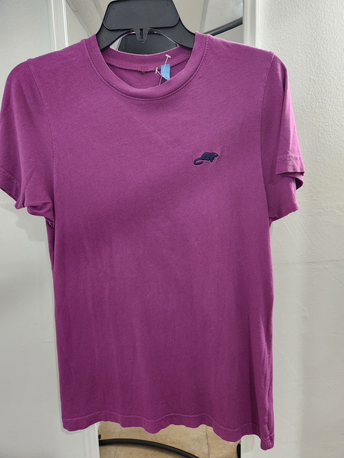 Purple Marc Jacobs short-sleeve crewneck T-shirt on hanger with small chest emblem