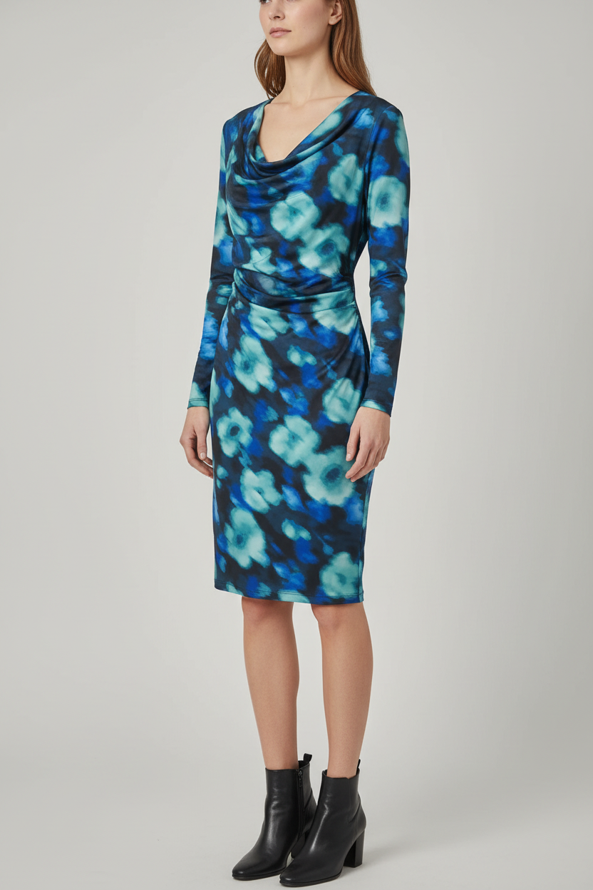 Model wearing a blue and black BAR III abstract-print dress with a cowl neckline and long sleeves